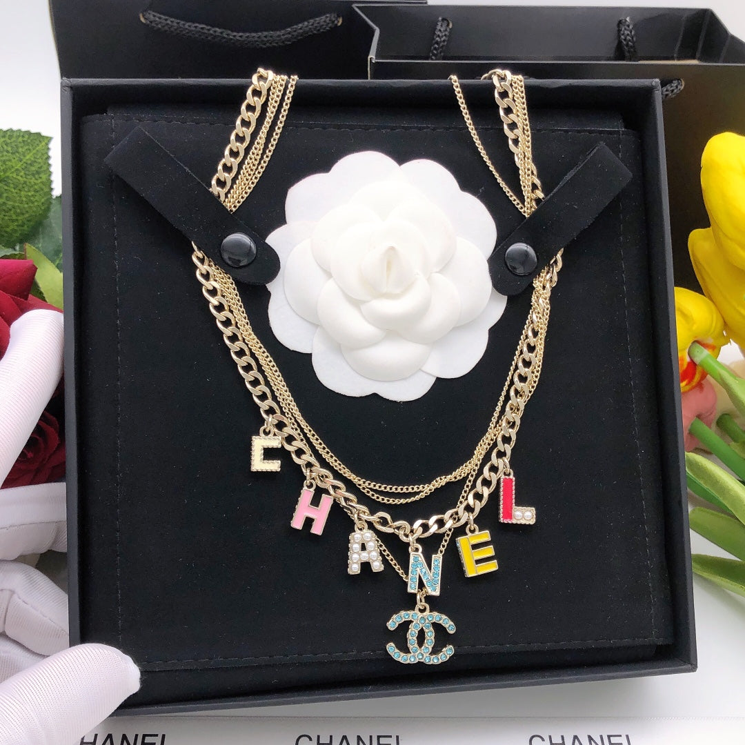 Chanel Color Typo 18K Gold Necklace