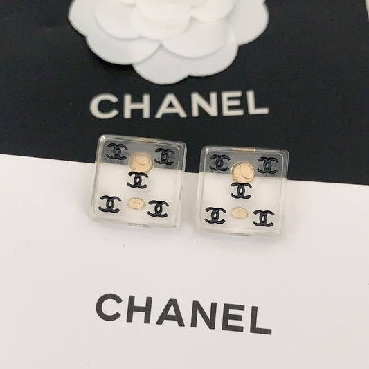 Chanel Transparent Resin 18K Gold Earrings