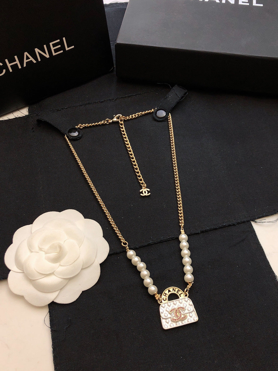Chanel Pearls Bag Pendant 18K Gold Necklace
