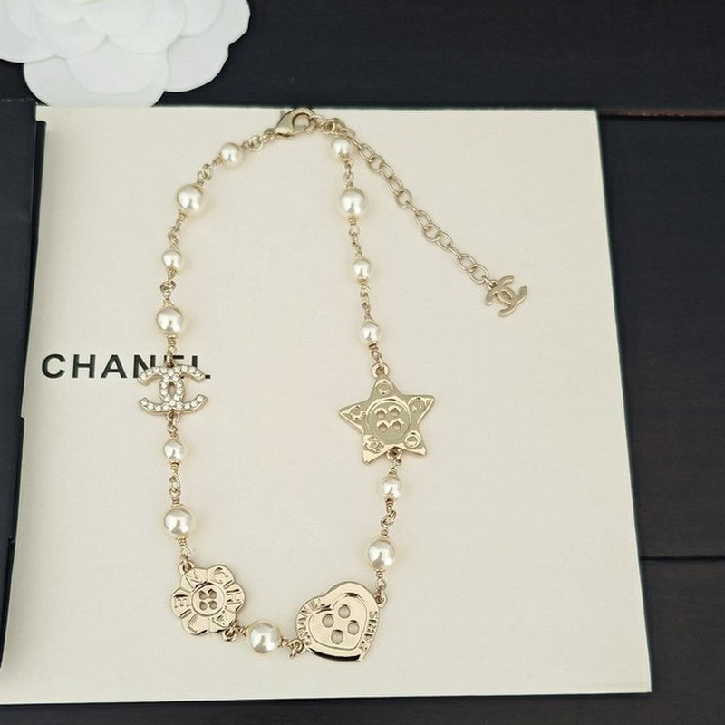 Chanel Pearl Star 18K Gold Necklace