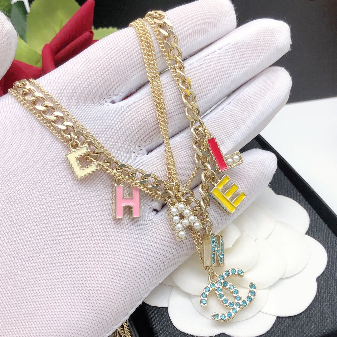 Chanel Color Typo 18K Gold Necklace