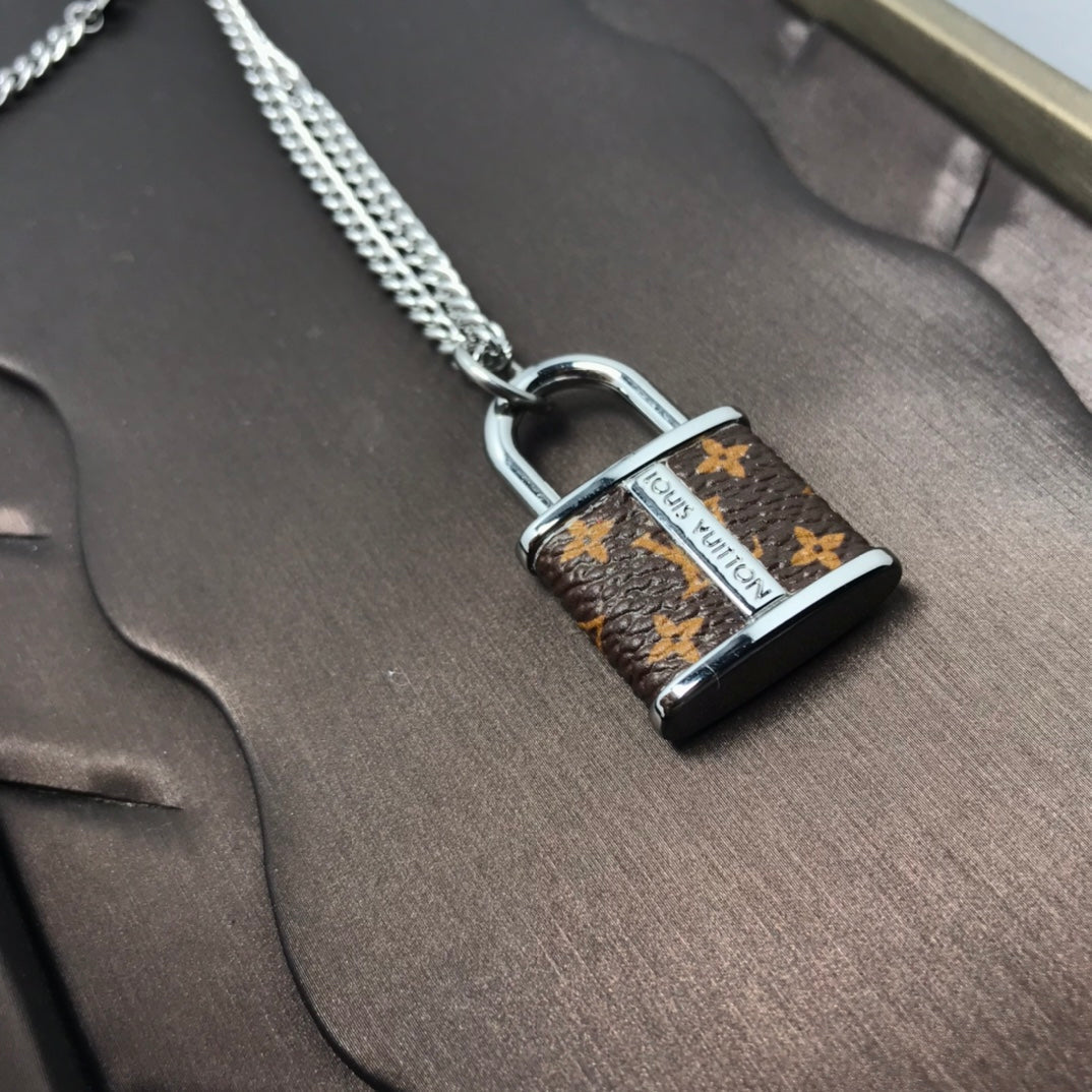 Louis Vuitton Monogram Lock Pendant 18K Gold Necklace