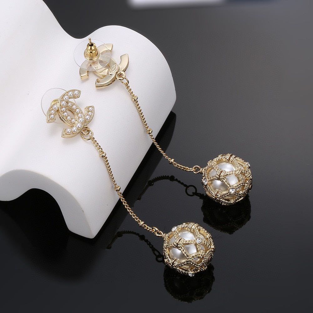 Chanel Pearl Long 18K Gold Earrings