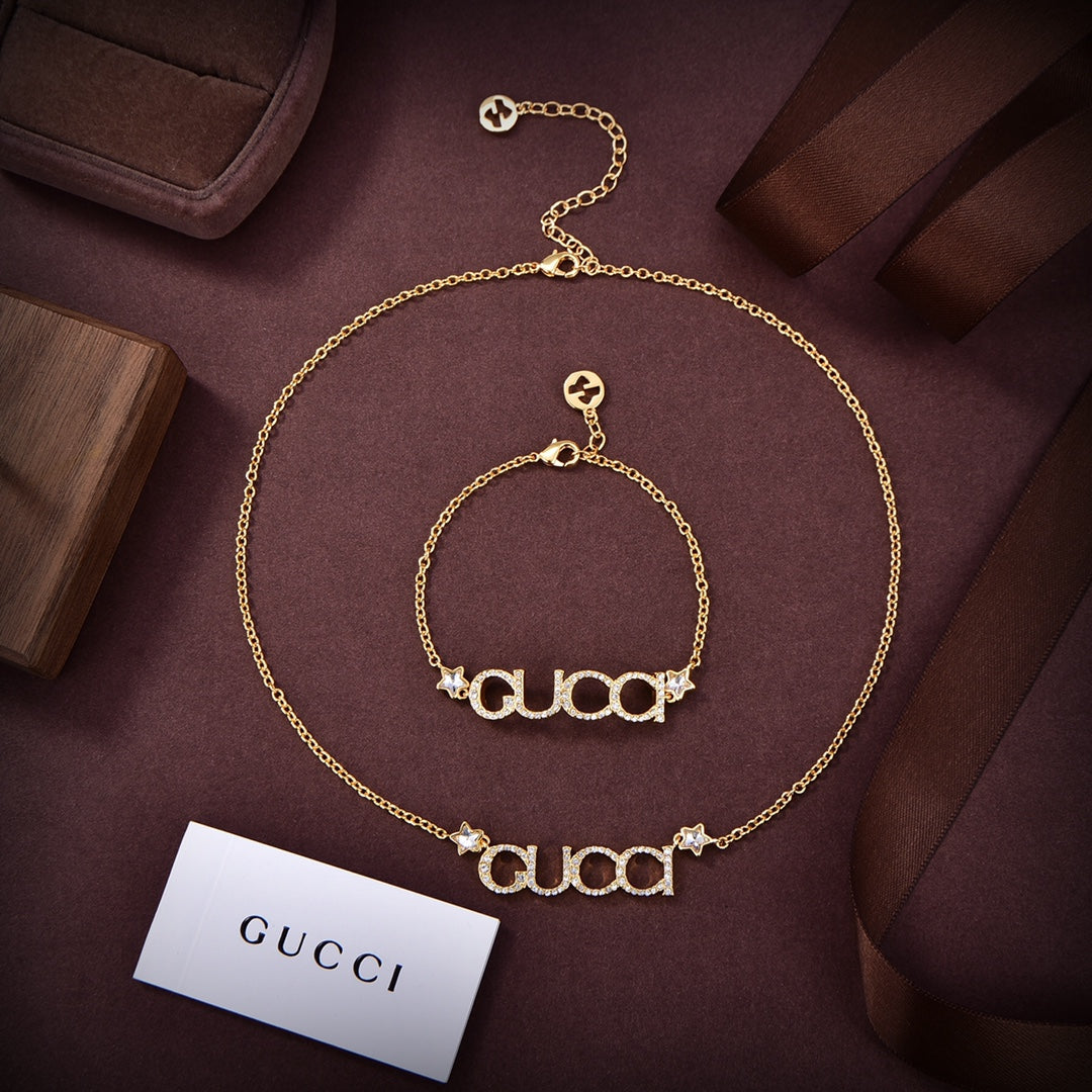 Gucci Double Embellished Script Letter 18K Gold Earrings