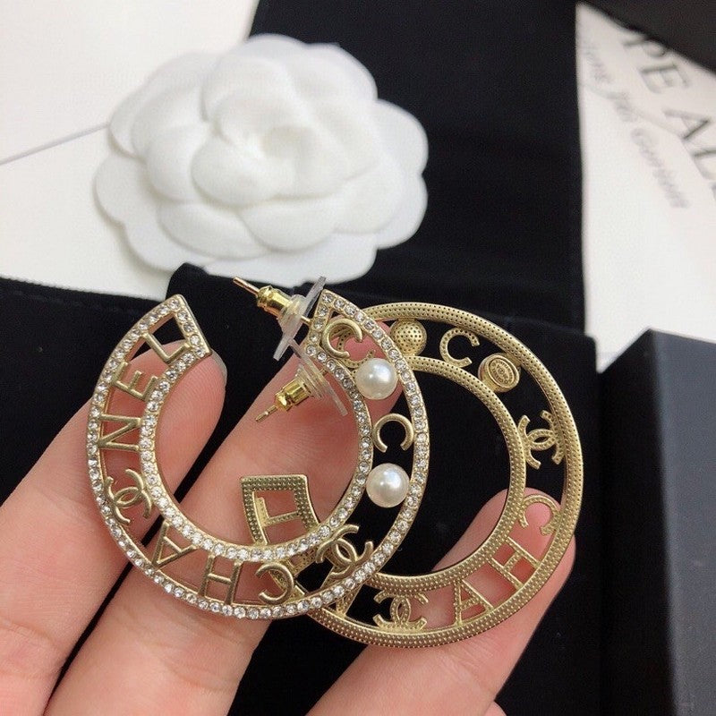 Chanel Circle Pearl 18K Gold Earrings