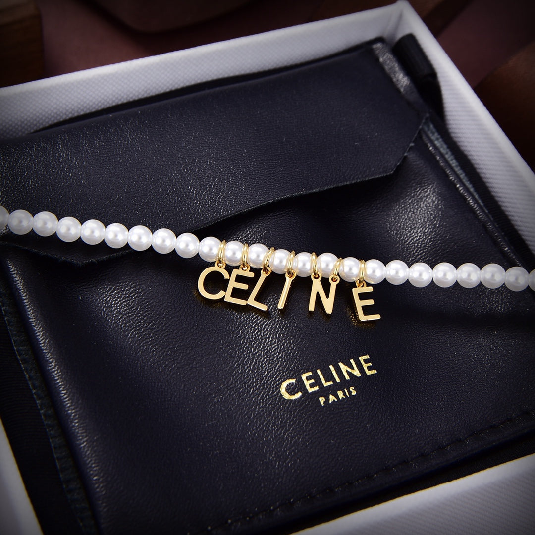 Celine Paris Pearls 18K Gold Bracelet