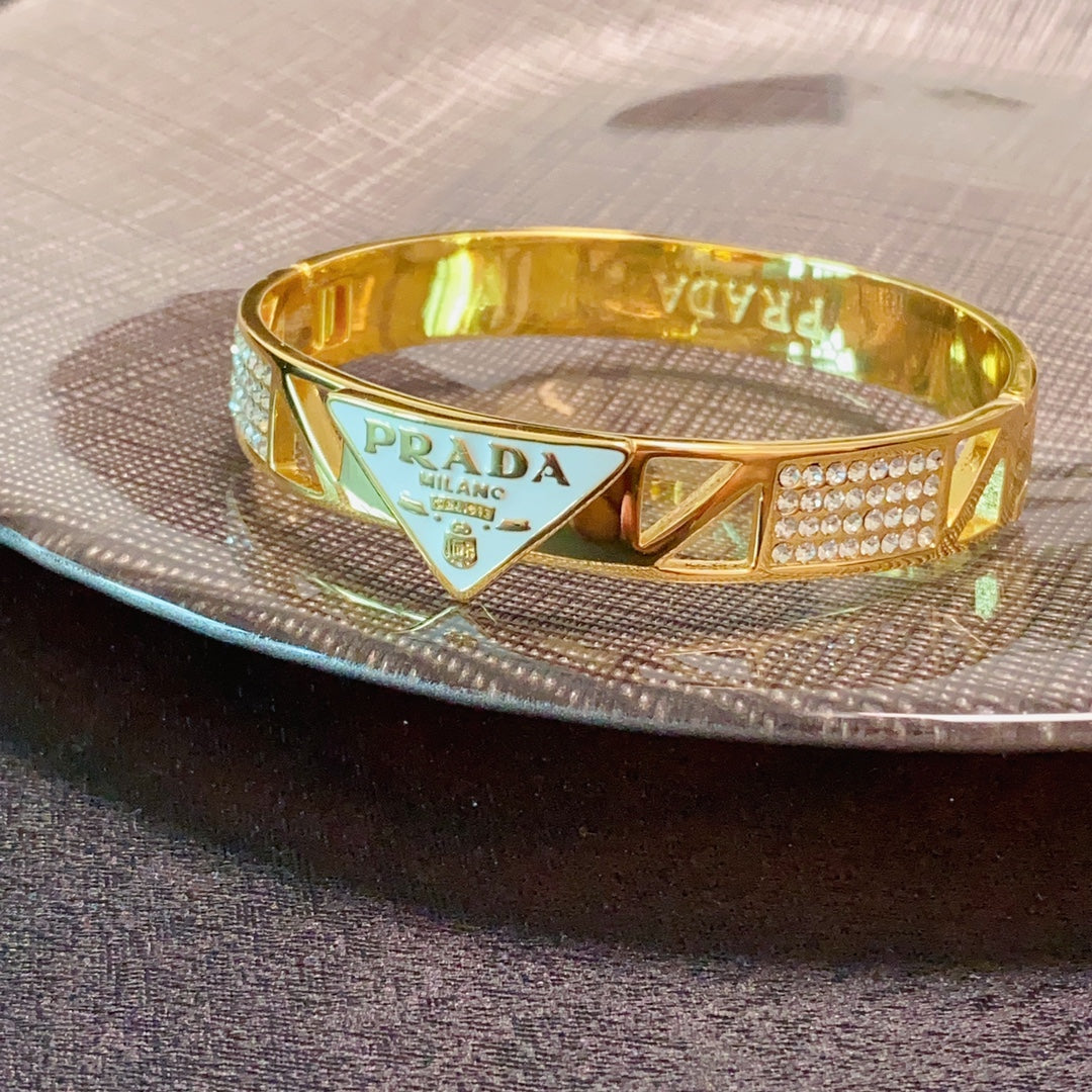 Prada Triangle Diamond 18K Gold Bracelet