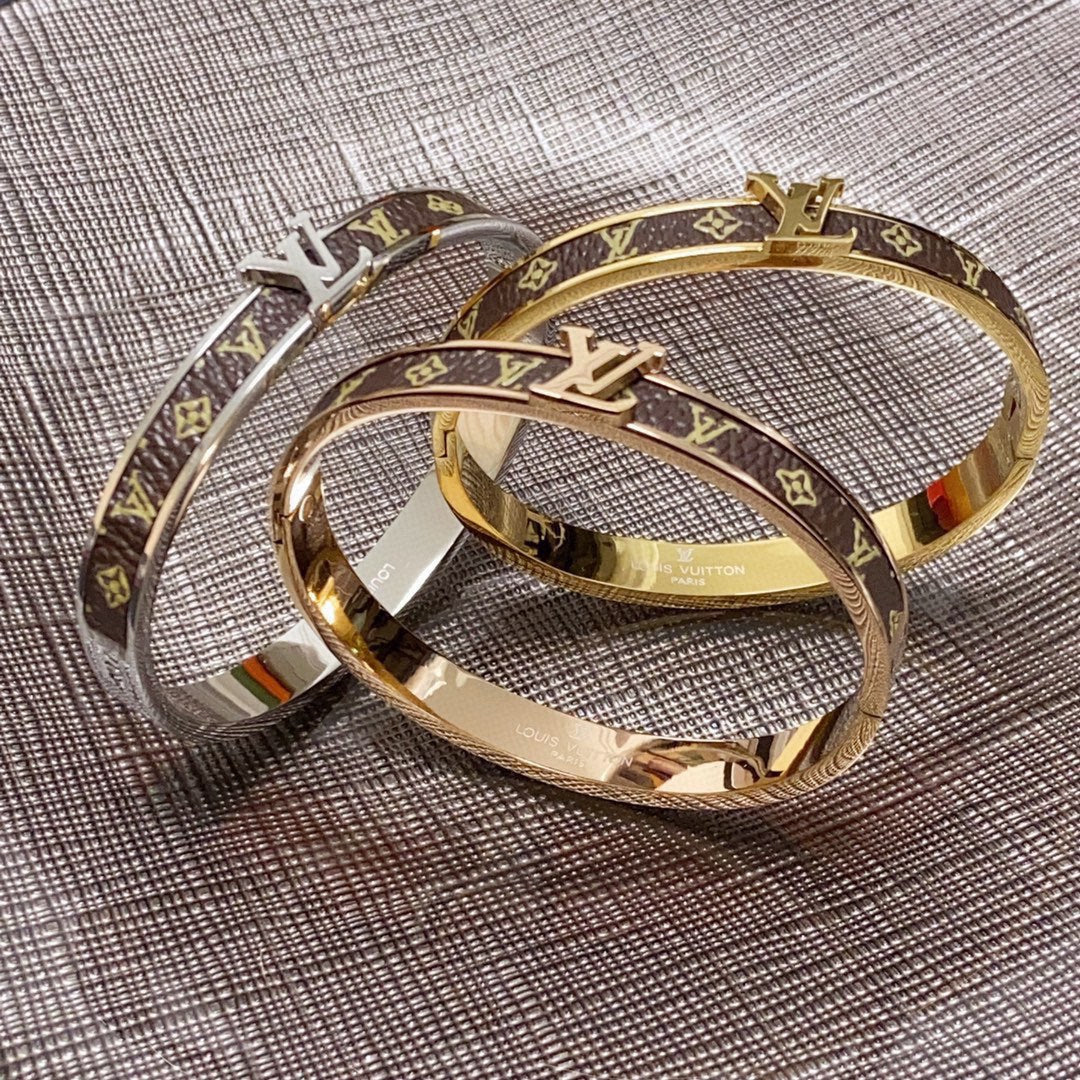Louis Vuitton Leather Vintage 18K Gold Bracelet